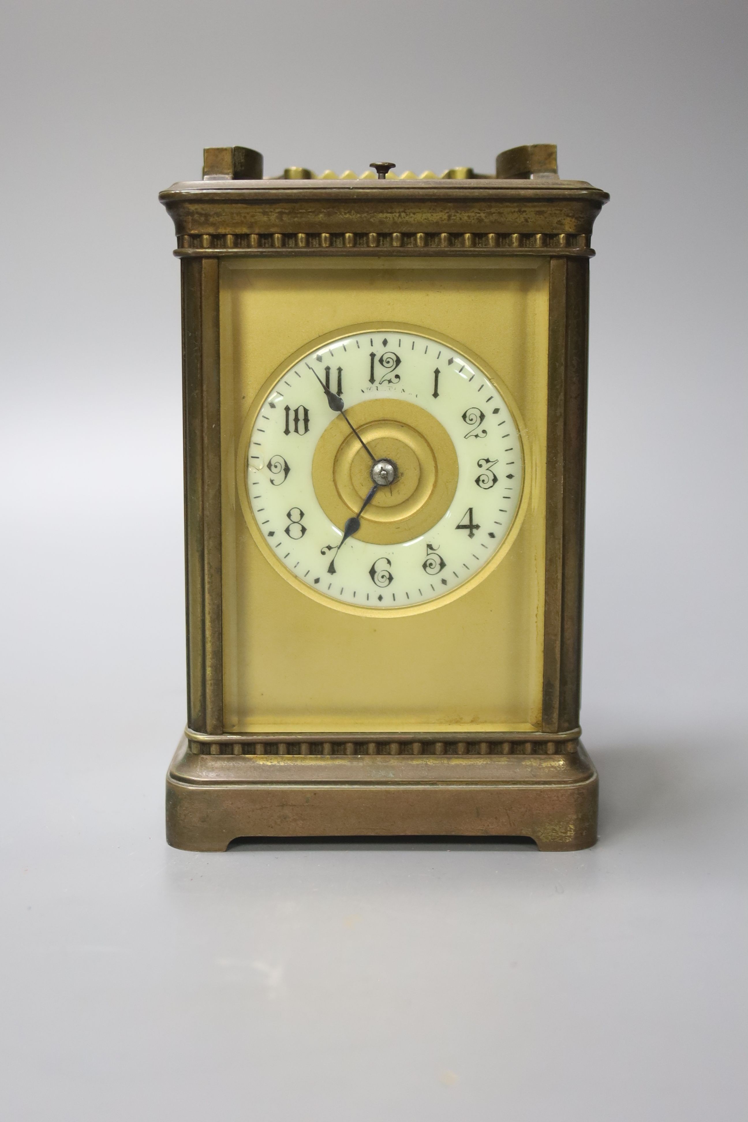 A French brass carriage clock with repeat, 18.5 cm high with the handle up